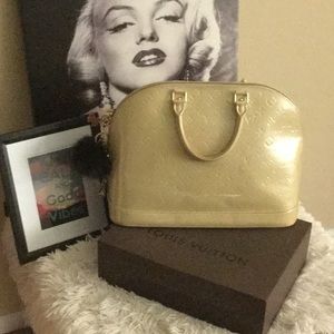 Louis Vuitton monogram elegance hand bag